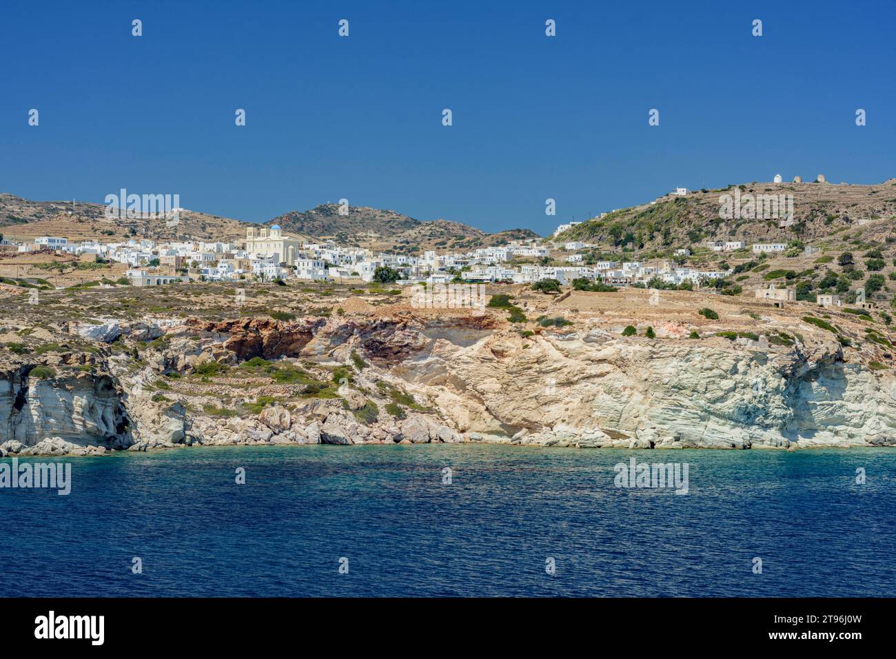Coastal view of Kimolos island with Chorio village perched on the hill Stock Photo