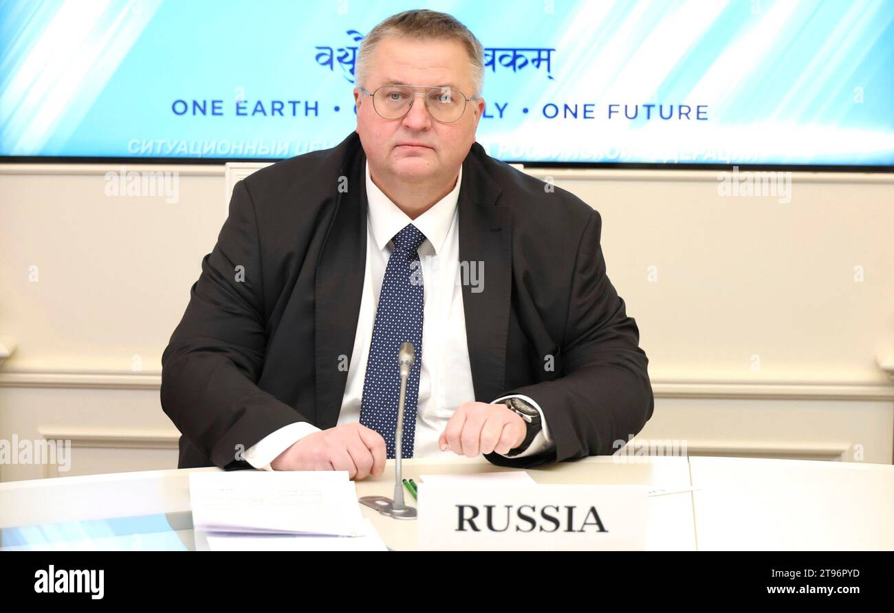 Moscow, Russia. 22nd Nov, 2023. Russian Deputy Prime Minister Alexei Overchuk listens during an extraordinary G20 summit hosted by Indian Prime Minister Narendra Modi via video link from the Kremlin, November 22, 2023 in Moscow, Russia. Credit: Mikhail Klimentyev/Kremlin Pool/Alamy Live News Stock Photo