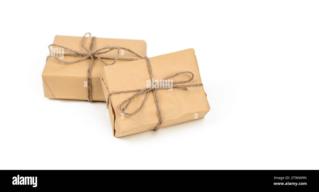 Brown Gift Boxes Isolated on White Background With Presents Stock Photo