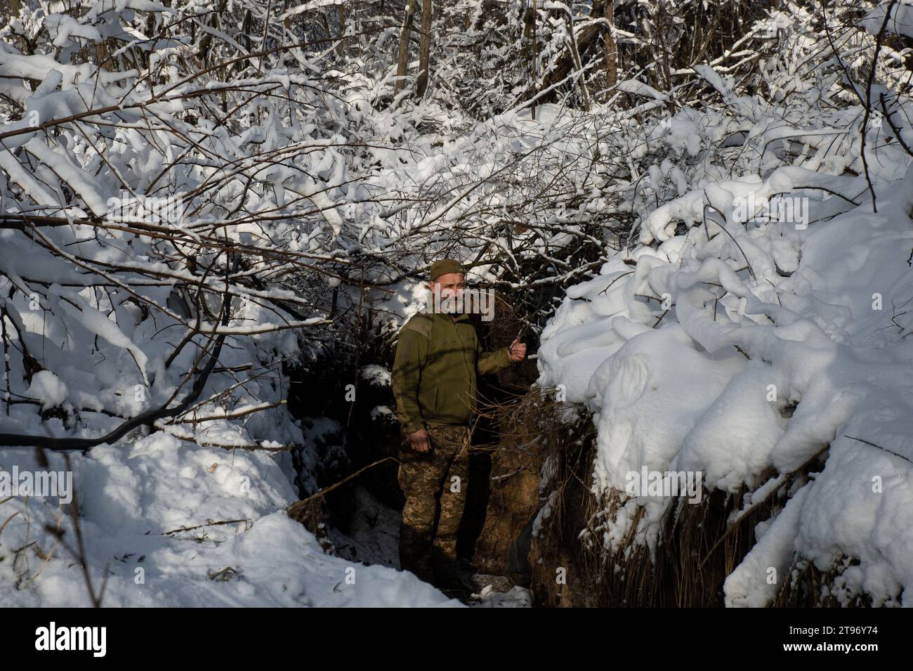 Kupyansk, Kharkiv Oblast, Ukraine. 22nd Nov, 2023. Ukrainian service member, Leche, stands outside of his command trench in the Kharkiv region. Commanding an artillery position in the region, Ukrainian troops prepare for winter and potential Russian assaults. (Credit Image: © Madeleine Kelly/ZUMA Press Wire) EDITORIAL USAGE ONLY! Not for Commercial USAGE! Stock Photo