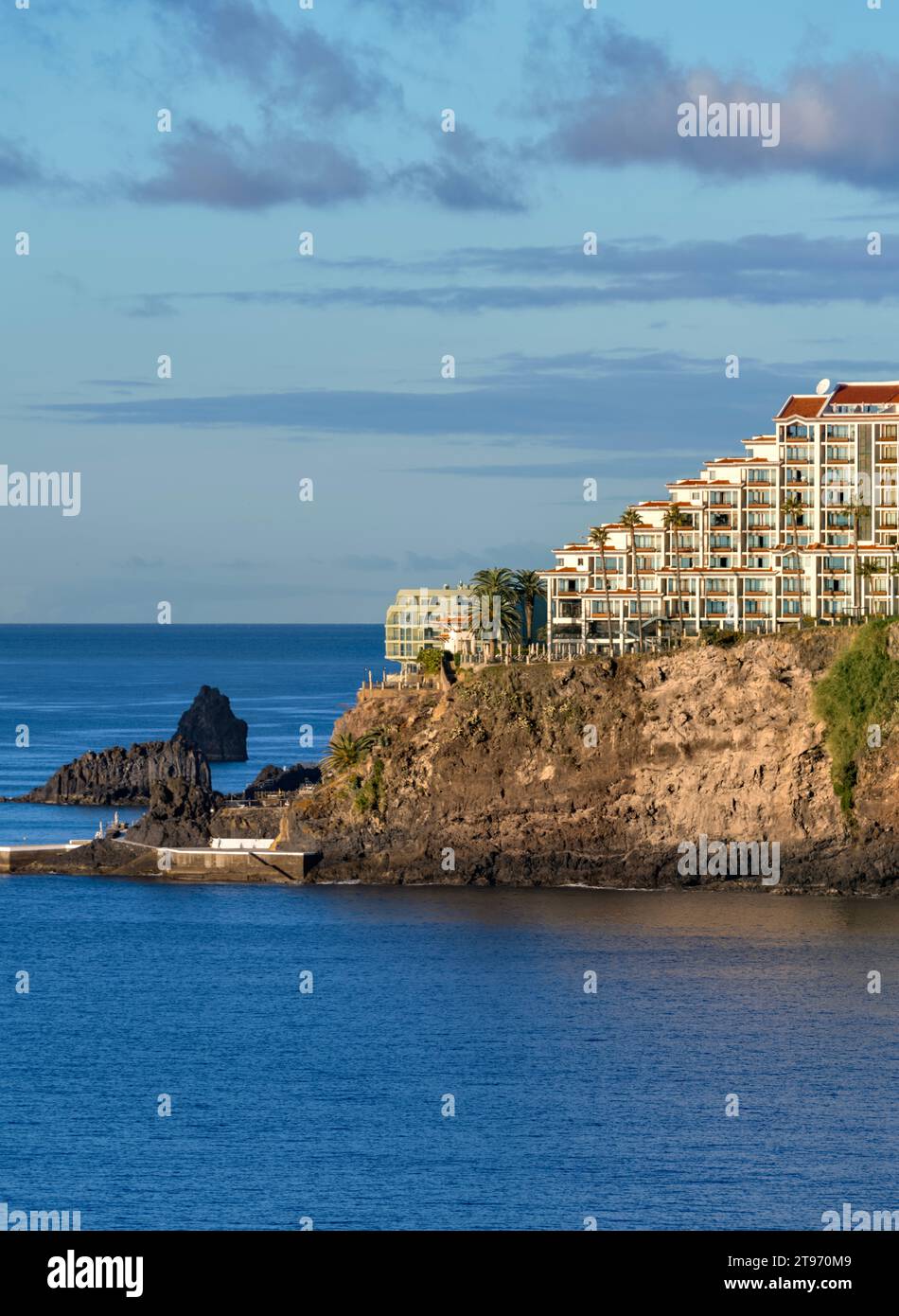 Port and Harbour Funchal, Portugal with surrounding apartment buildings and hotels Stock Photo