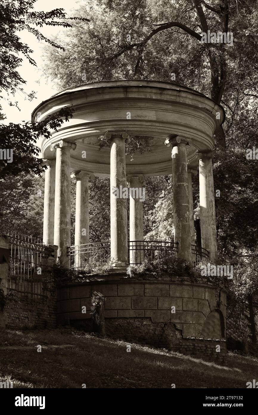 Old abandoned rotunda in the park Stock Photo