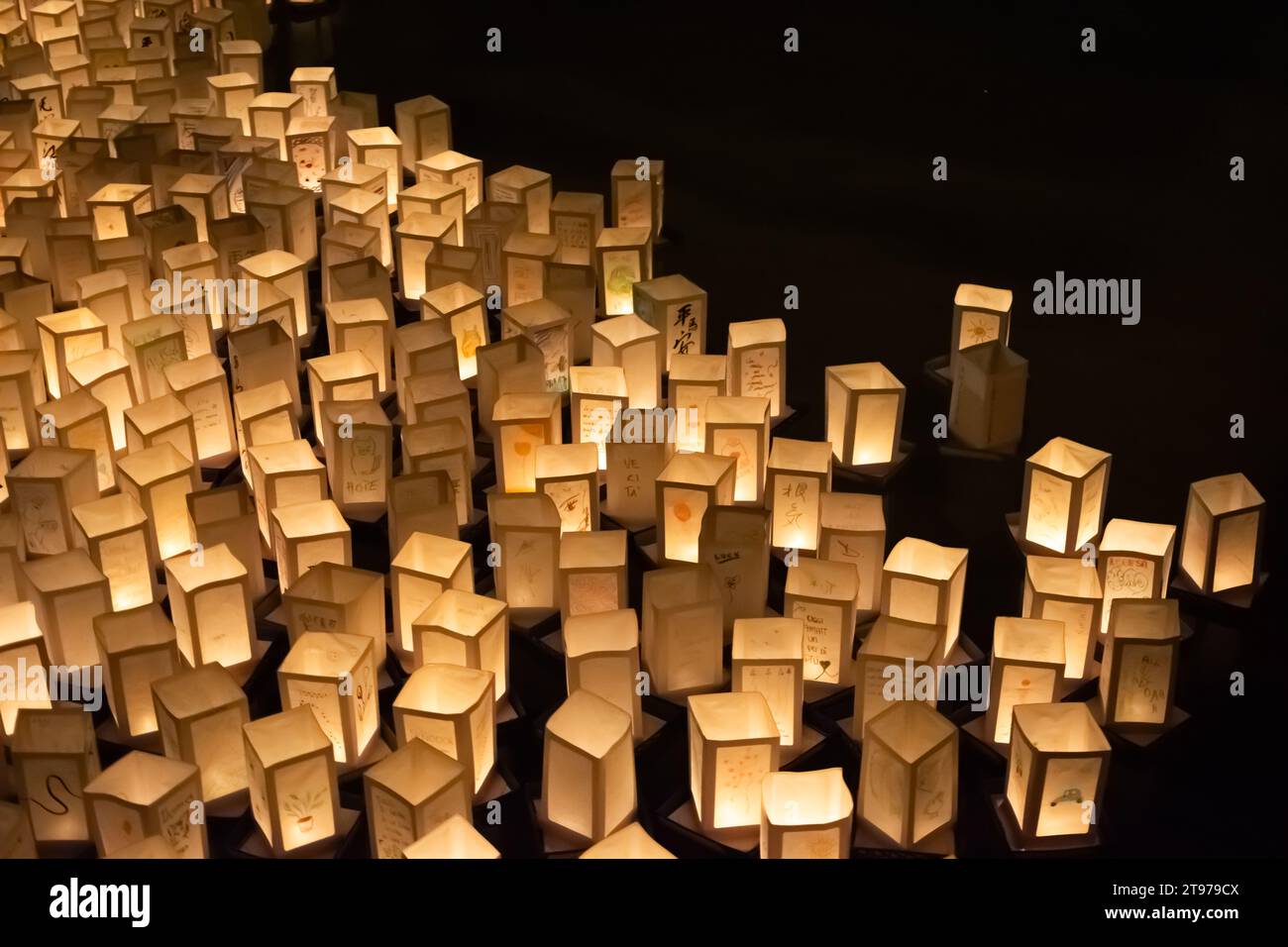 Japanese commemoration of atomic bombs with paper lanterns floating on water Stock Photo Alamy