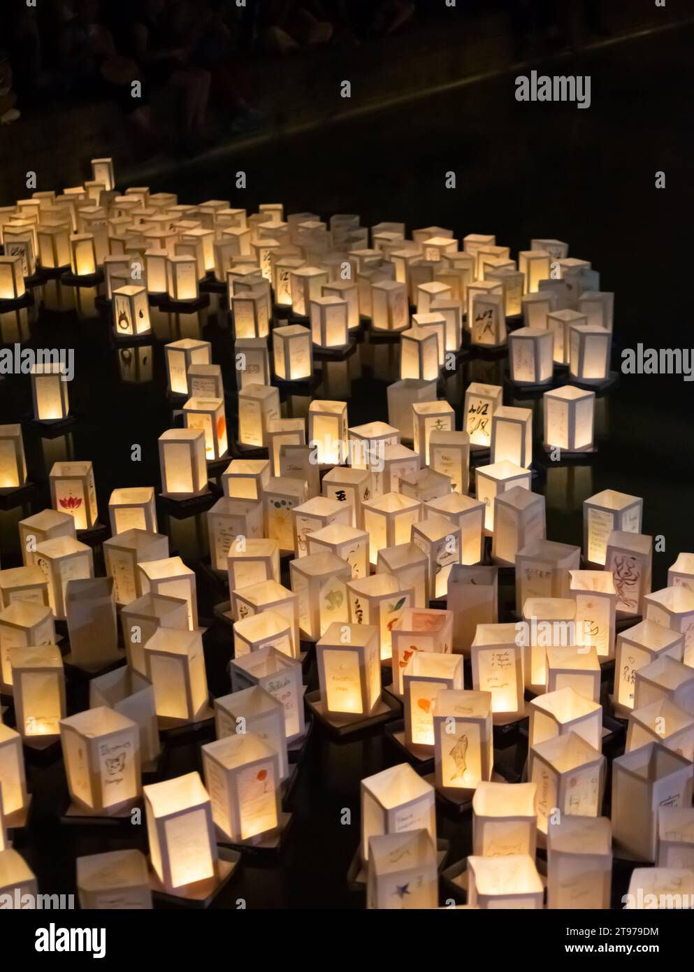 Japanese commemoration of atomic bombs with paper lanterns floating on water Stock Photo Alamy