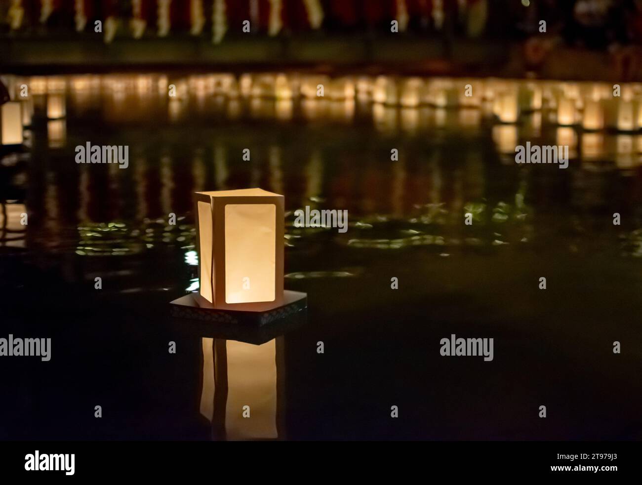 Japanese commemoration of atomic bombs with paper lanterns floating on water Stock Photo Alamy