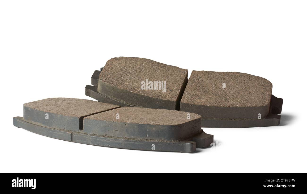 closeup of car disc brake pads, crucial components of vehicle braking