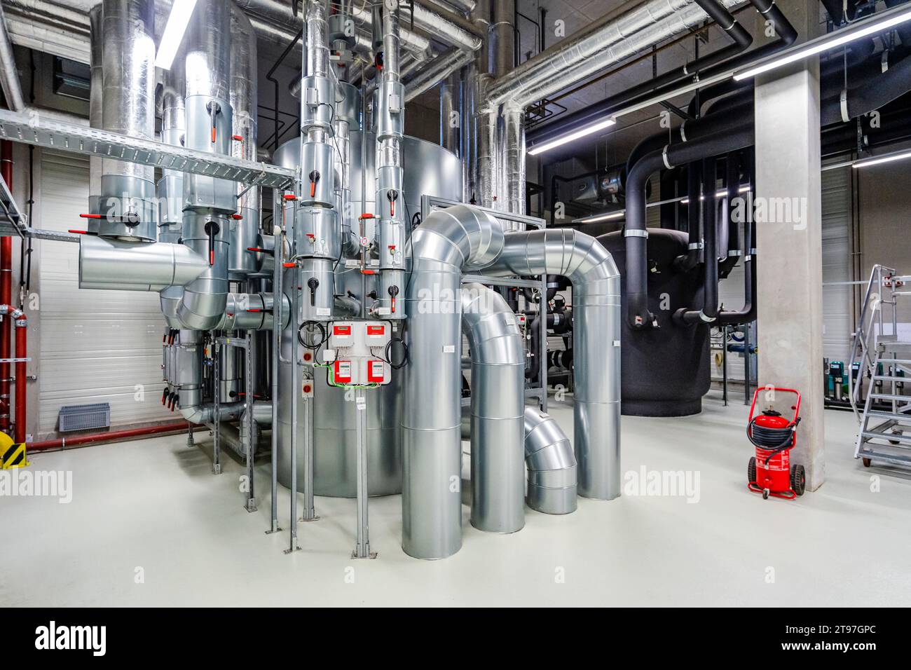 Pipework in a factory for energy distribution Stock Photo