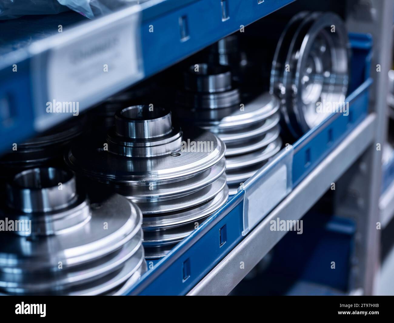 Metal spare parts on shelf at warehouse Stock Photo
