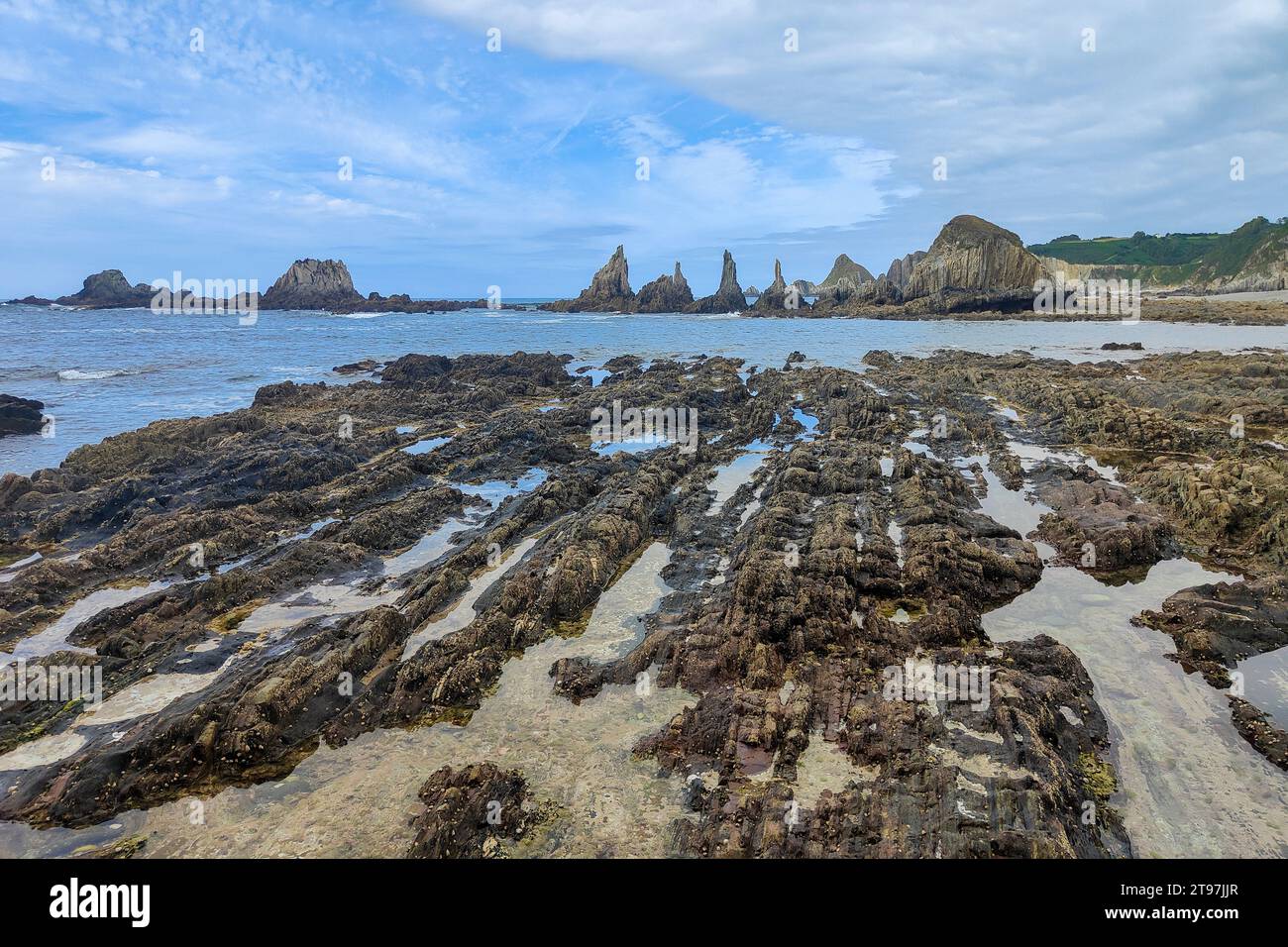 Jagged rock pools filled sea hi-res stock photography and images - Alamy
