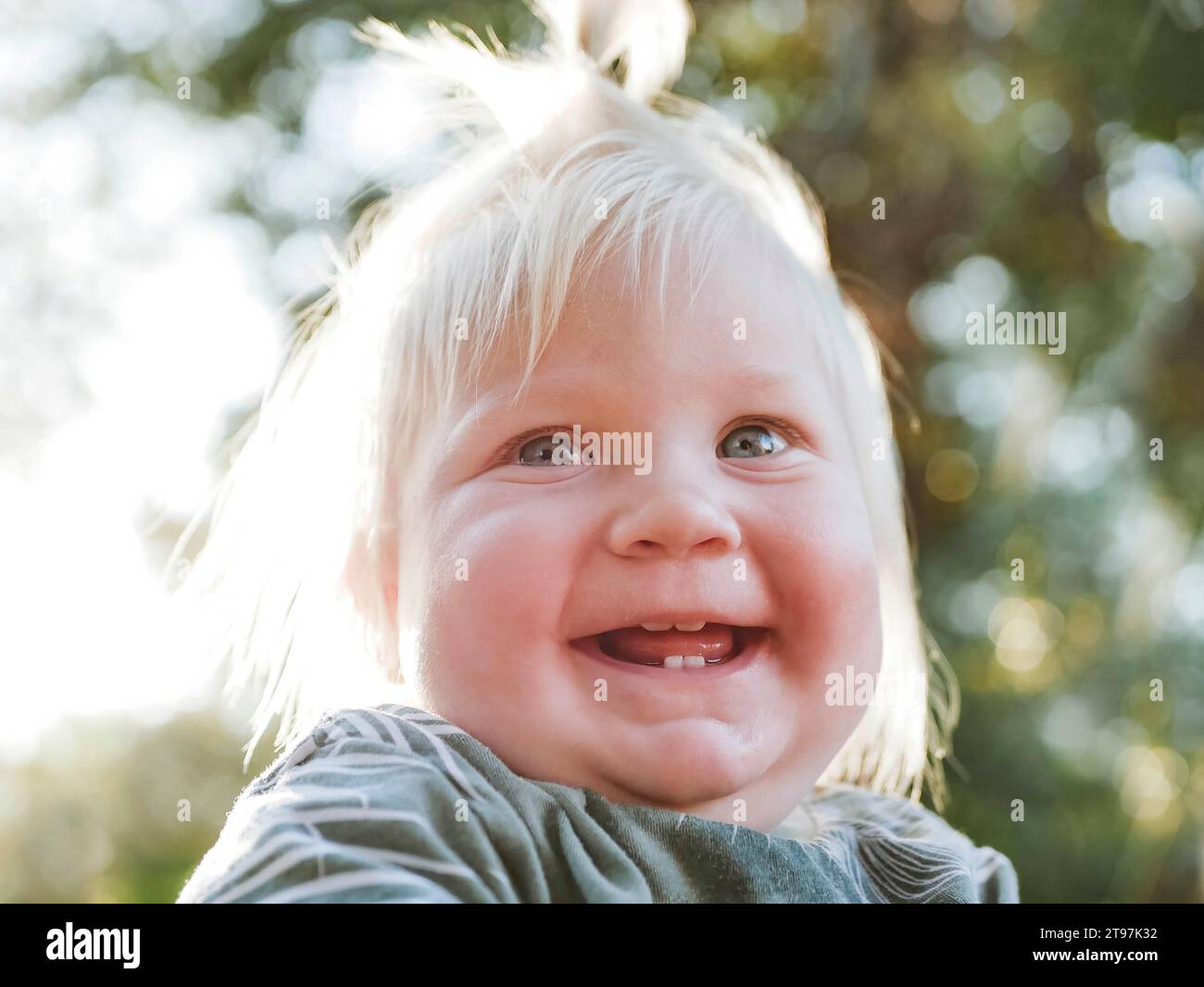 Baby 12 months smiling hi-res stock photography and images - Alamy