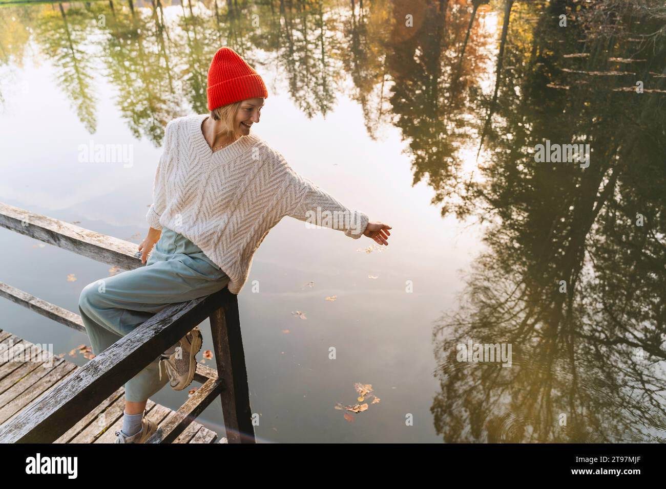 Arm On Railing Arms sitting people reaching hi-res stock photography and images - Alamy
