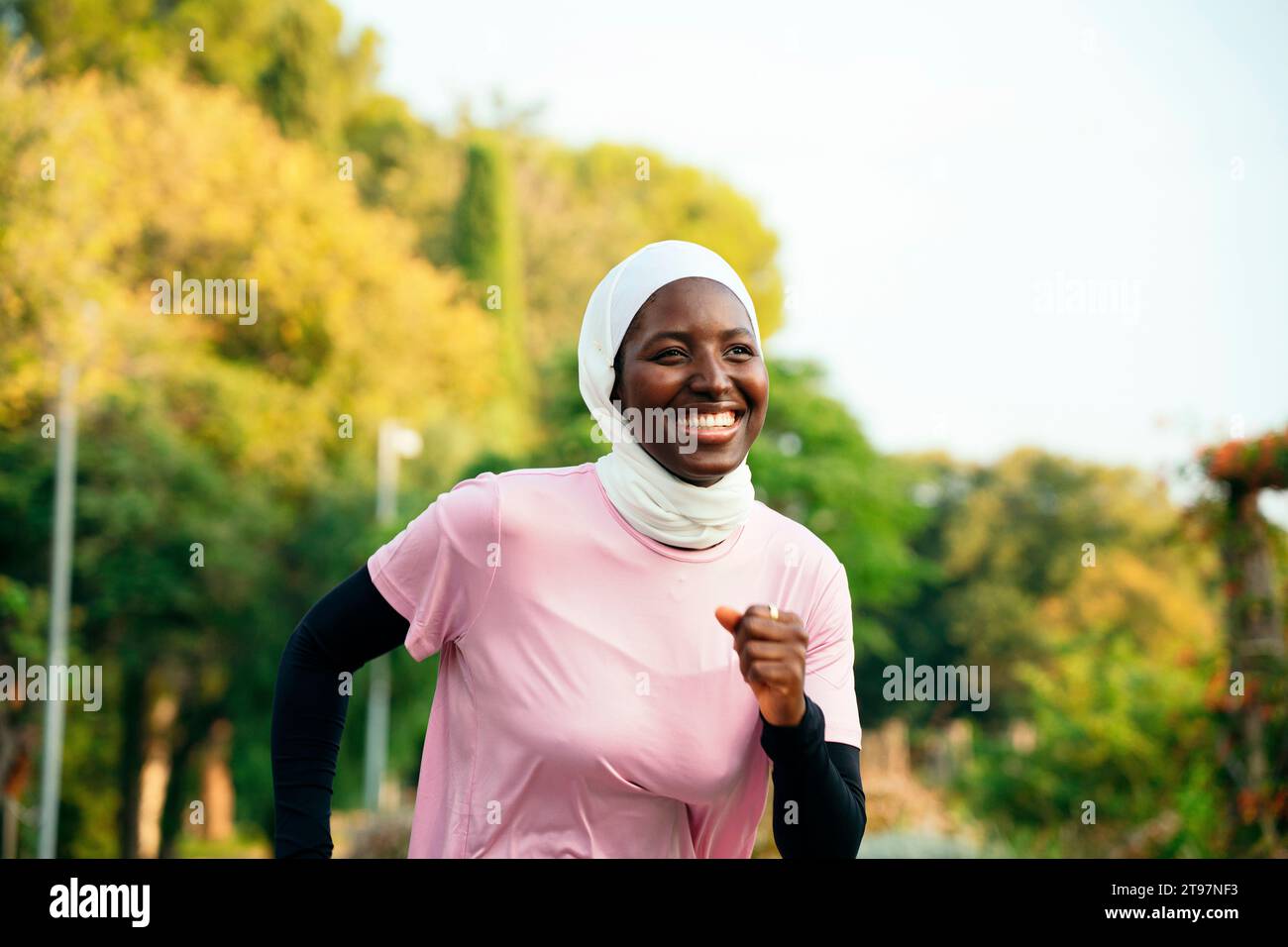 Young woman wearing pink hijab hi-res stock photography and images - Alamy