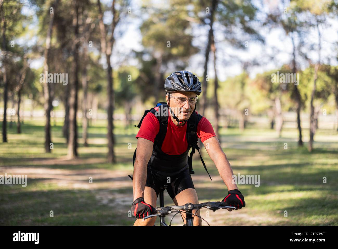 Man wearing safety helmet riding hi-res stock photography and images ...