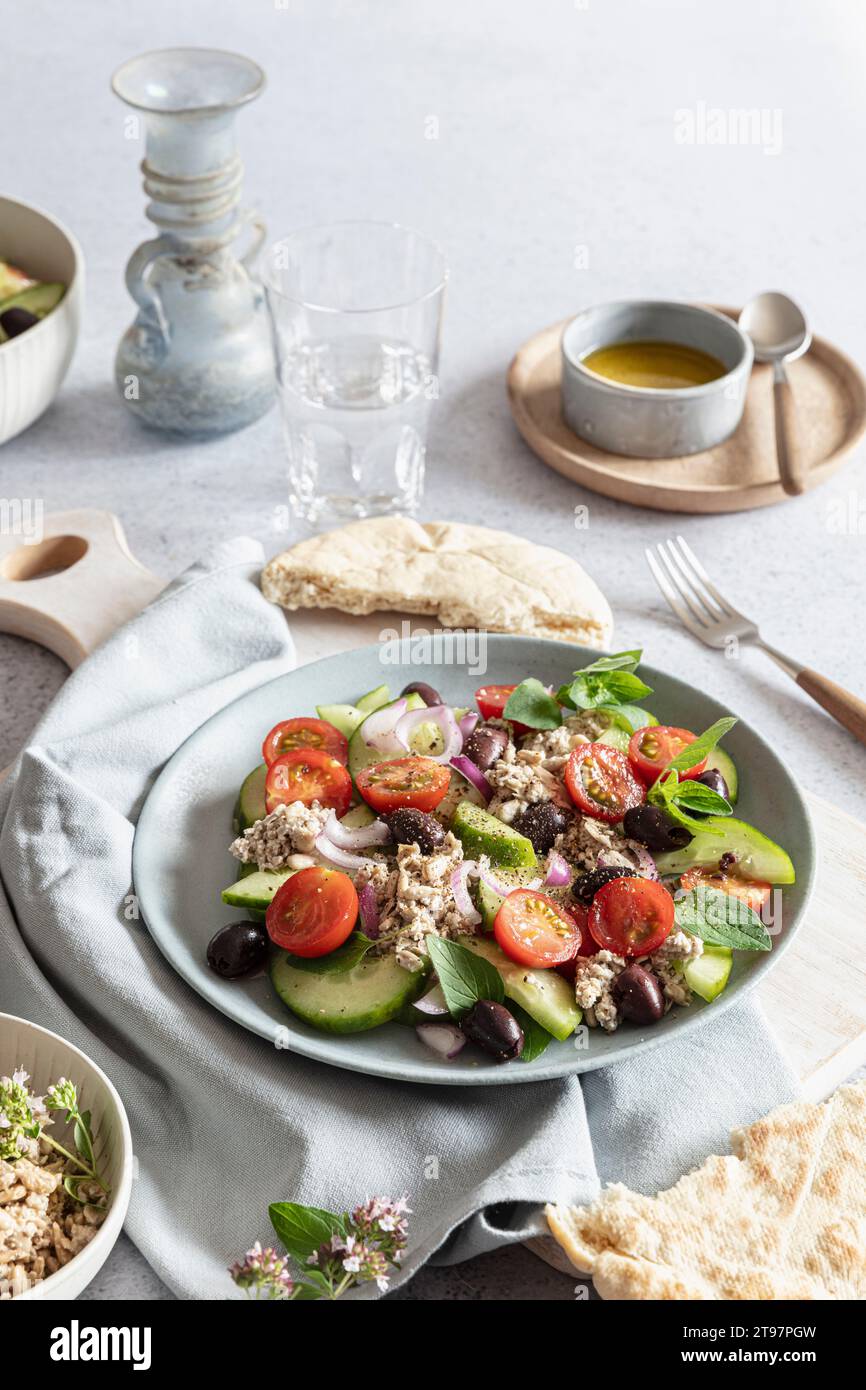 Greek salad with vegan feta cheese made from sunflower seeds Stock Photo