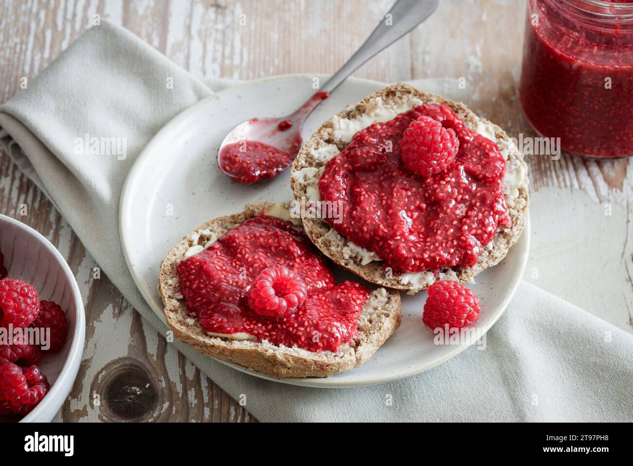 Studio shot of spelt buns with raspberry jam Stock Photo