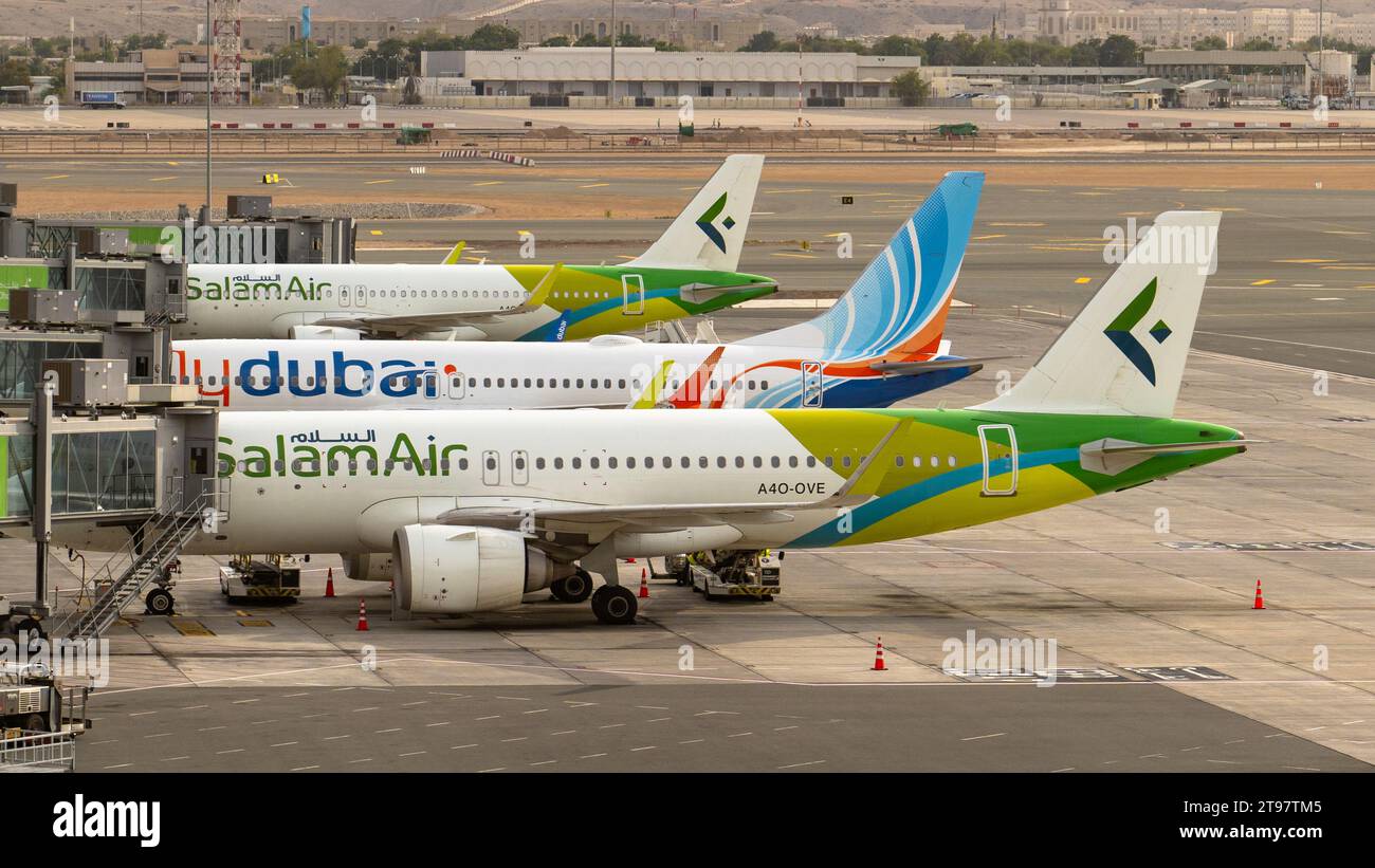 Muscat, oman November 21,2023 flydubai and salam air airplane getting