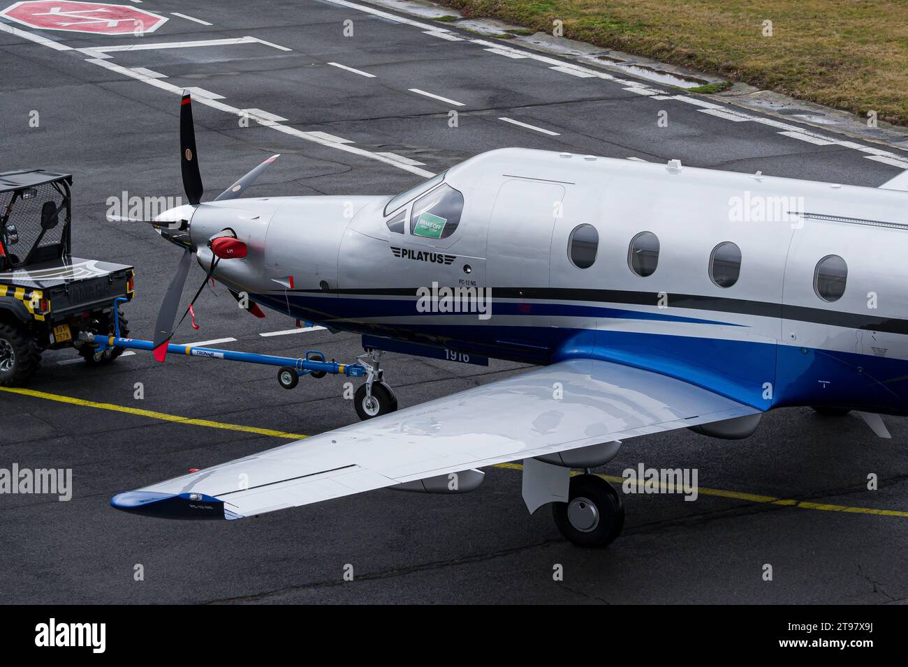 Pilatus PC-12 being tugged to the hangar after arriving in Ostrava Stock Photo