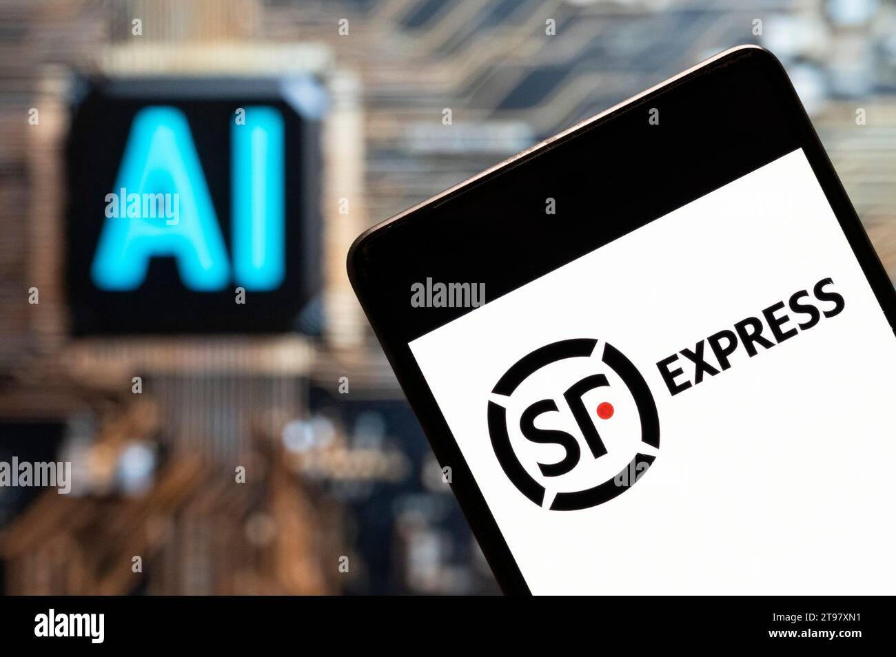China. 11th Nov, 2023. In this photo illustration, the Chinese multinational delivery services and logistics company, SF Express, logo seen displayed on a smartphone with an Artificial intelligence (AI) chip and symbol in the background. (Photo by Budrul Chukrut/SOPA Images/Sipa USA) *** Strictly for editorial news purposes only *** Credit: Sipa USA/Alamy Live News Stock Photo