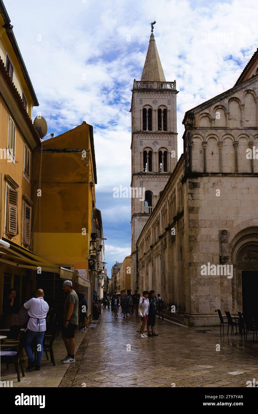 Main Street With People And The Cathedral Of St Anastasia In Old Town main-street-with-people-and-the-cathedral-of-st-anastasia-in-old-town