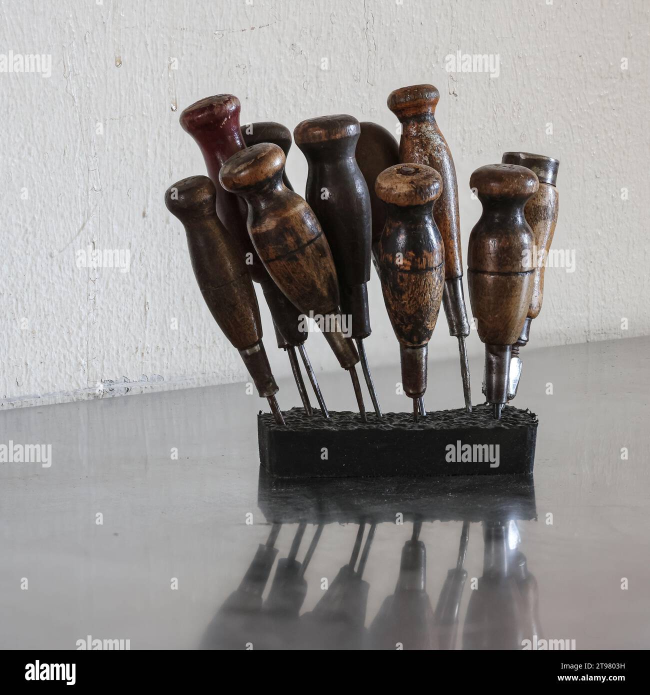 The old awls each have a decorated wooden handle and are tools for shoemakers. Stock Photo