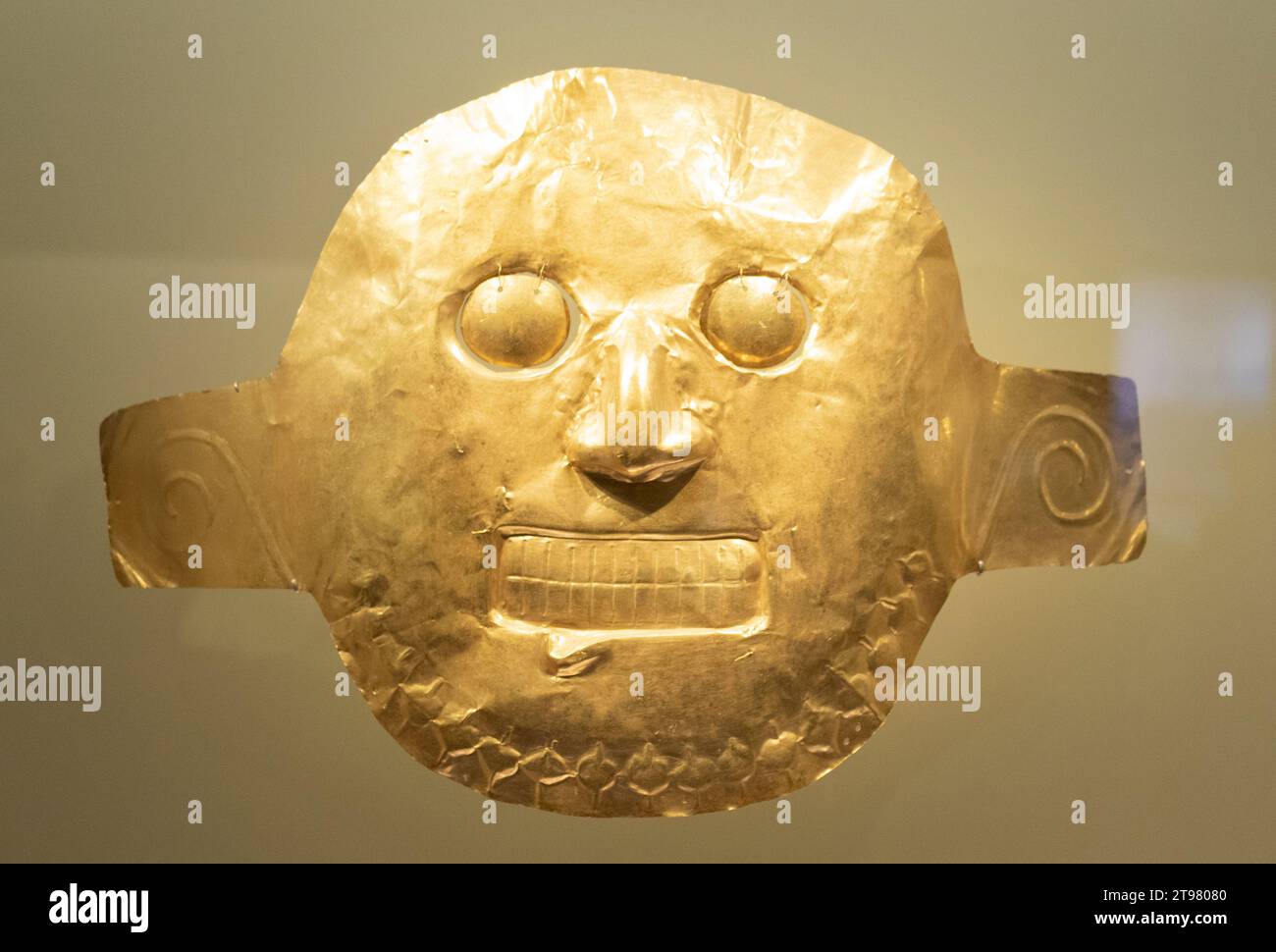 Pre columbus culture indigenous golden mask at golden museum Stock Photo