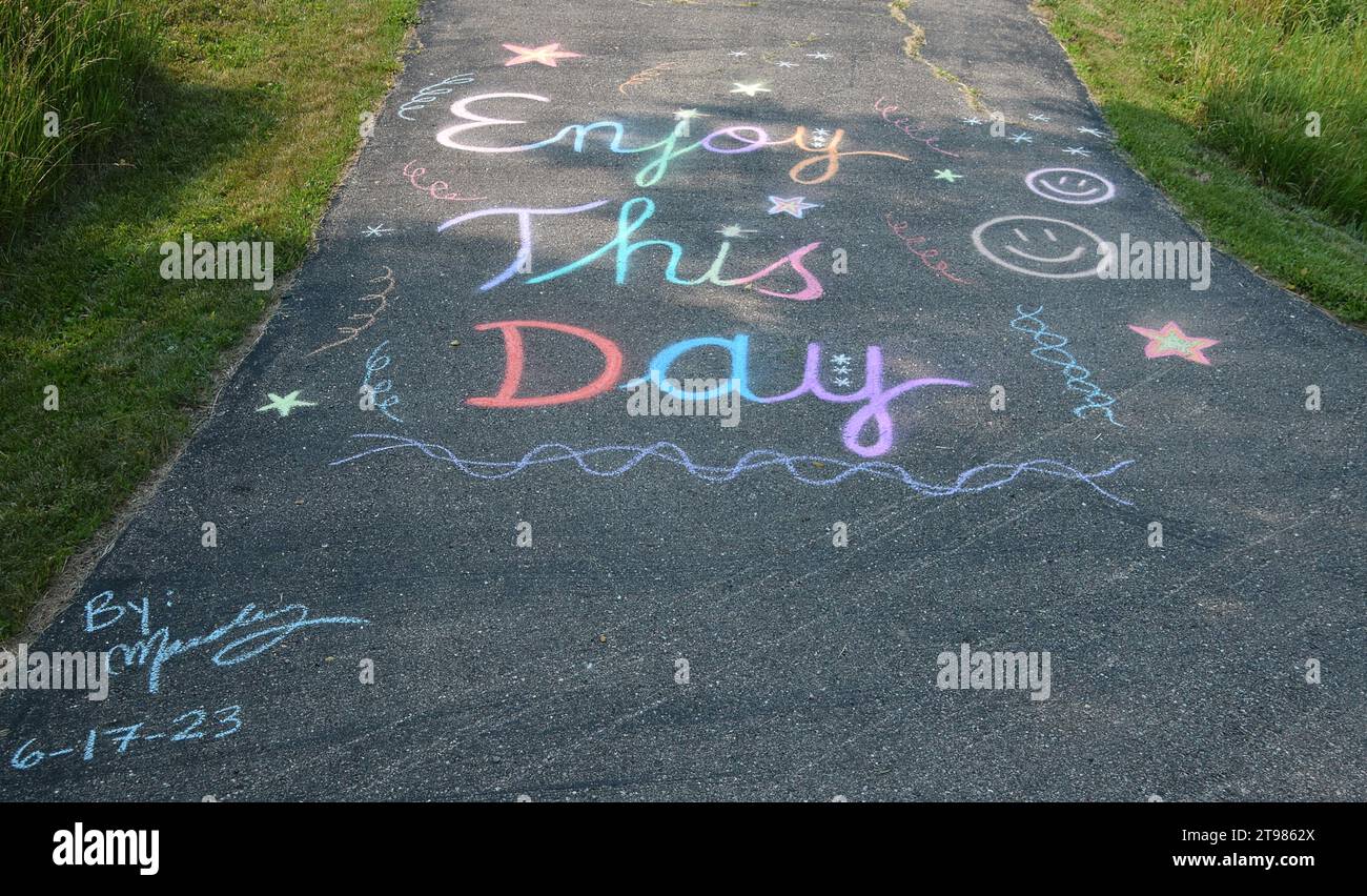 Uplifting Chalk Art 'Enjoy This Day' Stock Photo