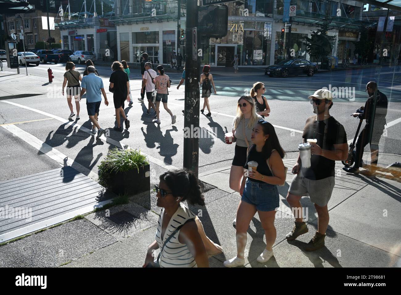 Vancouver, BC, Canada - August 15, 2023: People on the street in downtown of Vancouver. Stock Photo