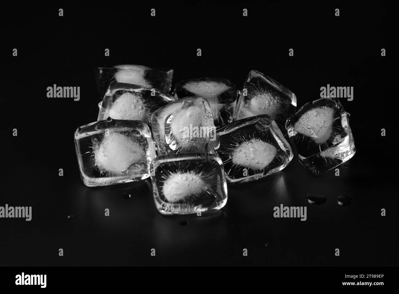 https://c8.alamy.com/comp/2T989EP/ice-cubes-isolated-on-black-background-2T989EP.jpg