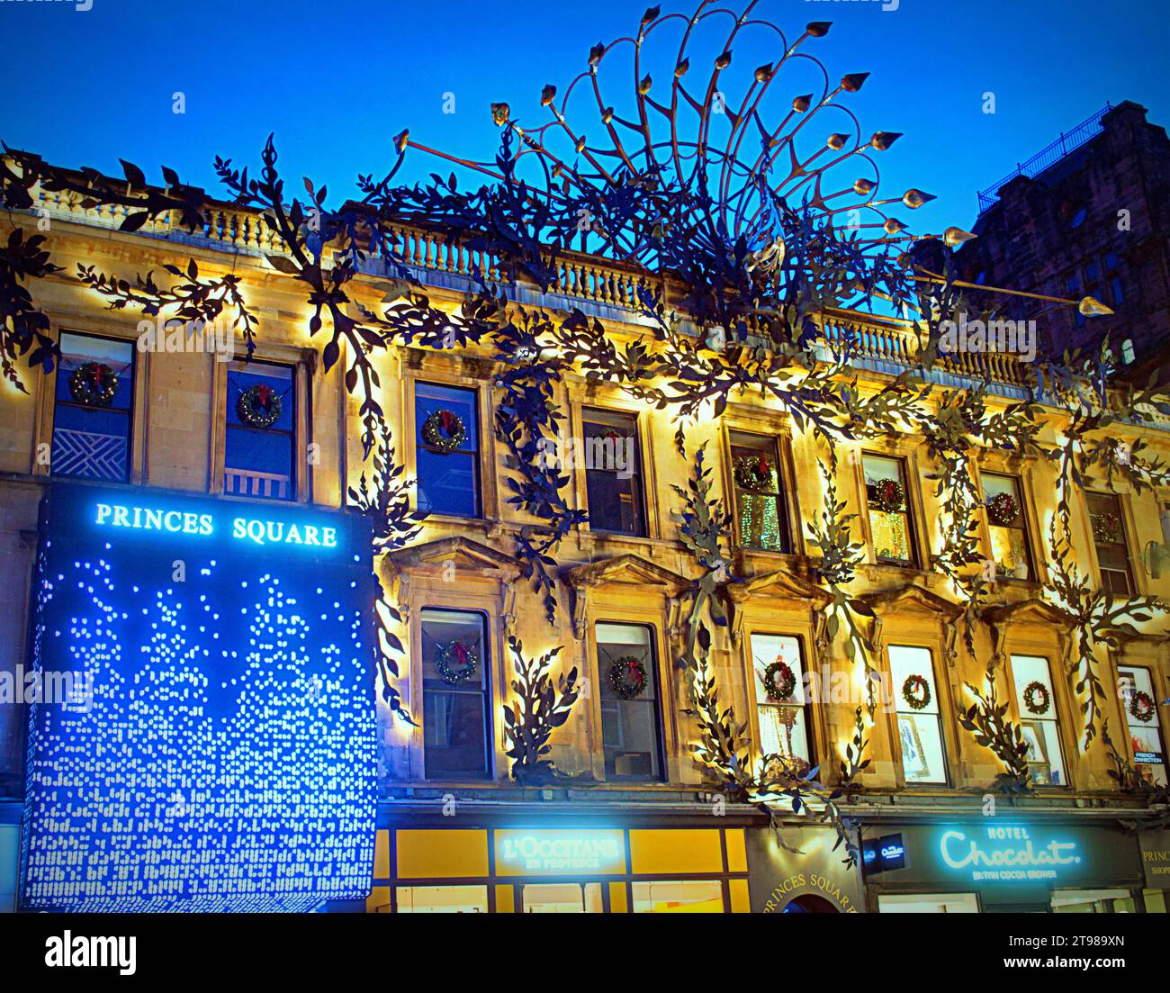 Glasgow, Scotland, UK. 23rd November, 2023. Christmas shopping saw shoppers out in force on the style mile of Scotland, Buchanan street  as princes square shopping centres peacock was lit up and projected for yuletide. Credit Gerard Ferry/Alamy Live News Stock Photo