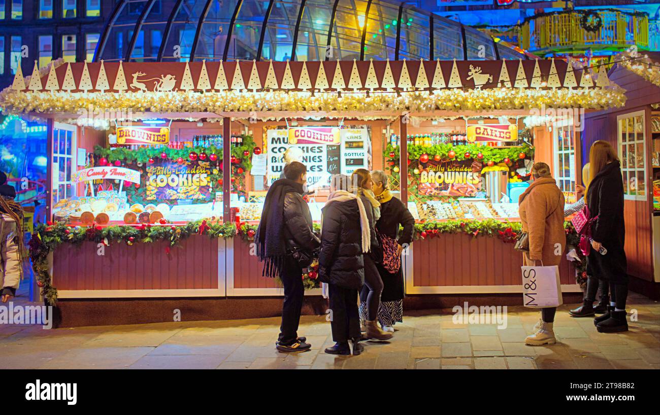 Glasgow, Scotland, UK. 23rd November, 2023. Christmas shopping saw shoppers out in force on the style mile of Scotland, as visitors to Winterfest in st enoch square  sampled the food and rides,. Credit Gerard Ferry/Alamy Live News Stock Photo