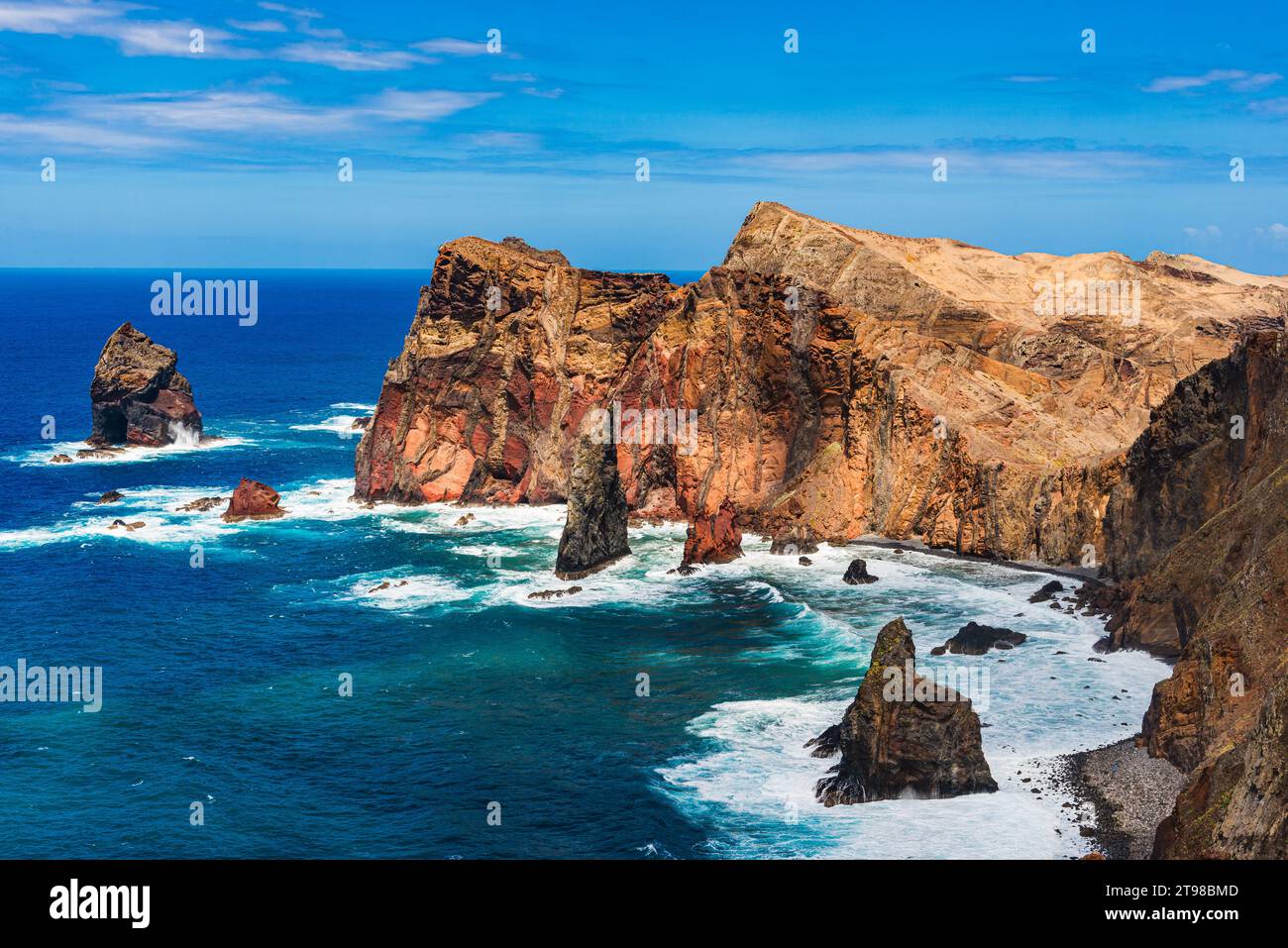 Dramatic rock formation and blue ocean on Madeira coast. Stock Photo