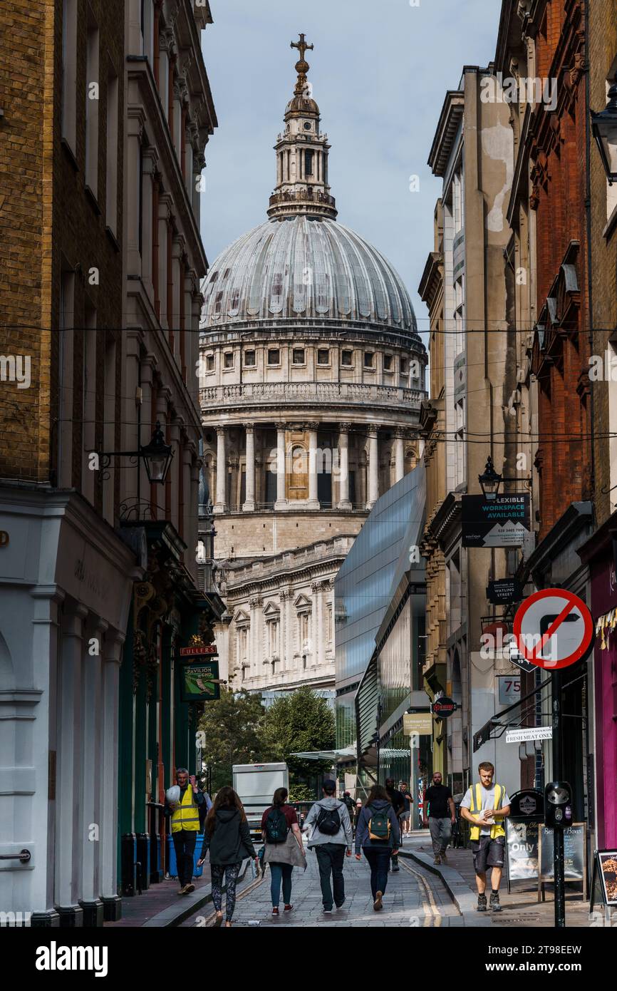 London, UK - August 25, 2023: View of Saint Paul Cathedral from Watling Street with people walking by Stock Photo