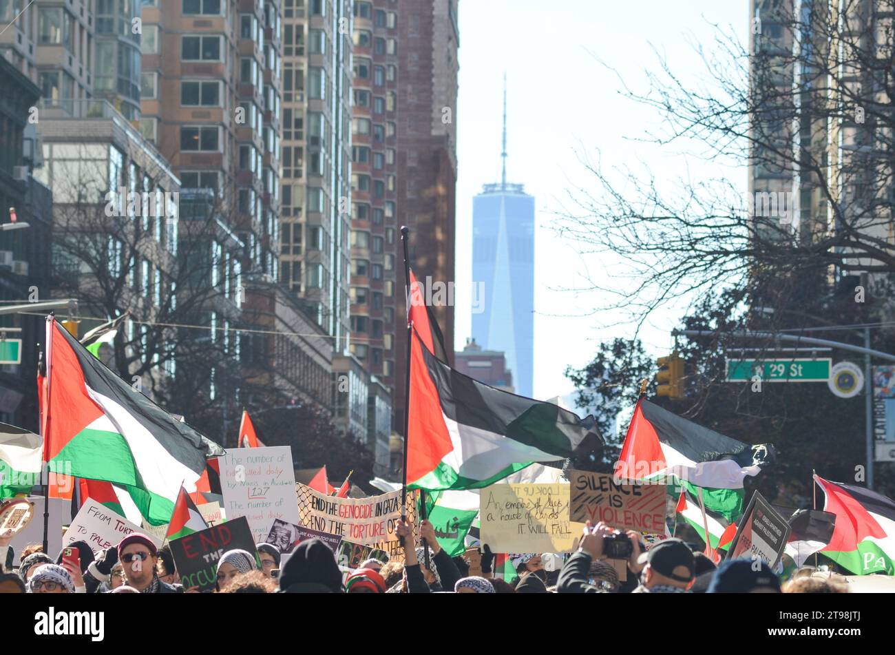 New York City, United States. 23rd November, 2023.  Palestine supporters of all ages and colors march the streets of Manhattan in support of Gaza. Credit: Ryan Rahman/Alamy Live News Stock Photo