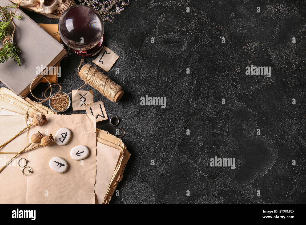 Witch's magic attributes on dark background Stock Photo - Alamy