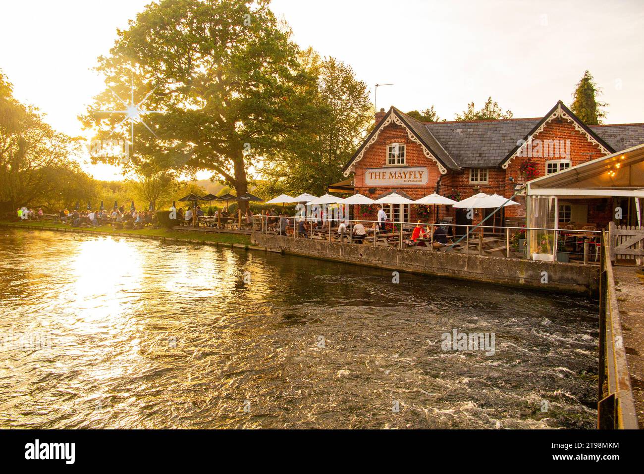 The famous Mayfly Pub on the banks of the River Test in Hampshire, England Stock Photo