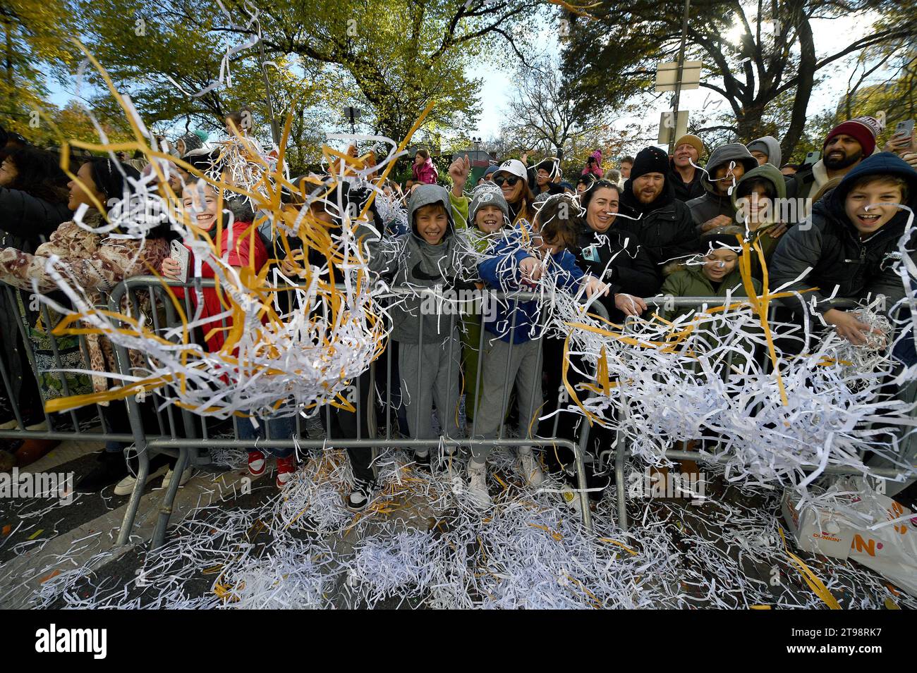 New York, USA. 23rd Nov, 2023. A group of children standing behind