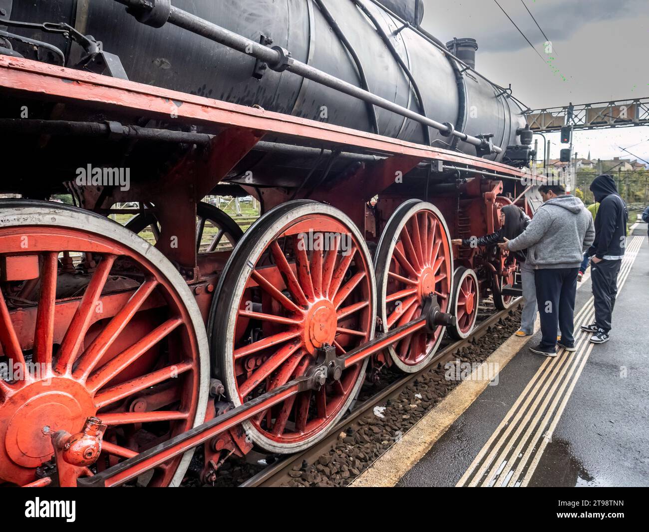 Steam locomotive Pacific 231065 in Petrosani station, Hunedoara county, Romania. Wheels details. Stock Photo