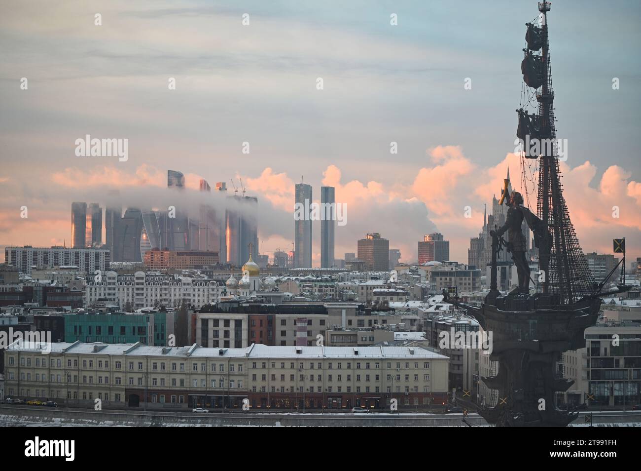 January 7, 2023, Moscow, Russia. Clouds over the Moscow City office center building on a winter day Stock Photo