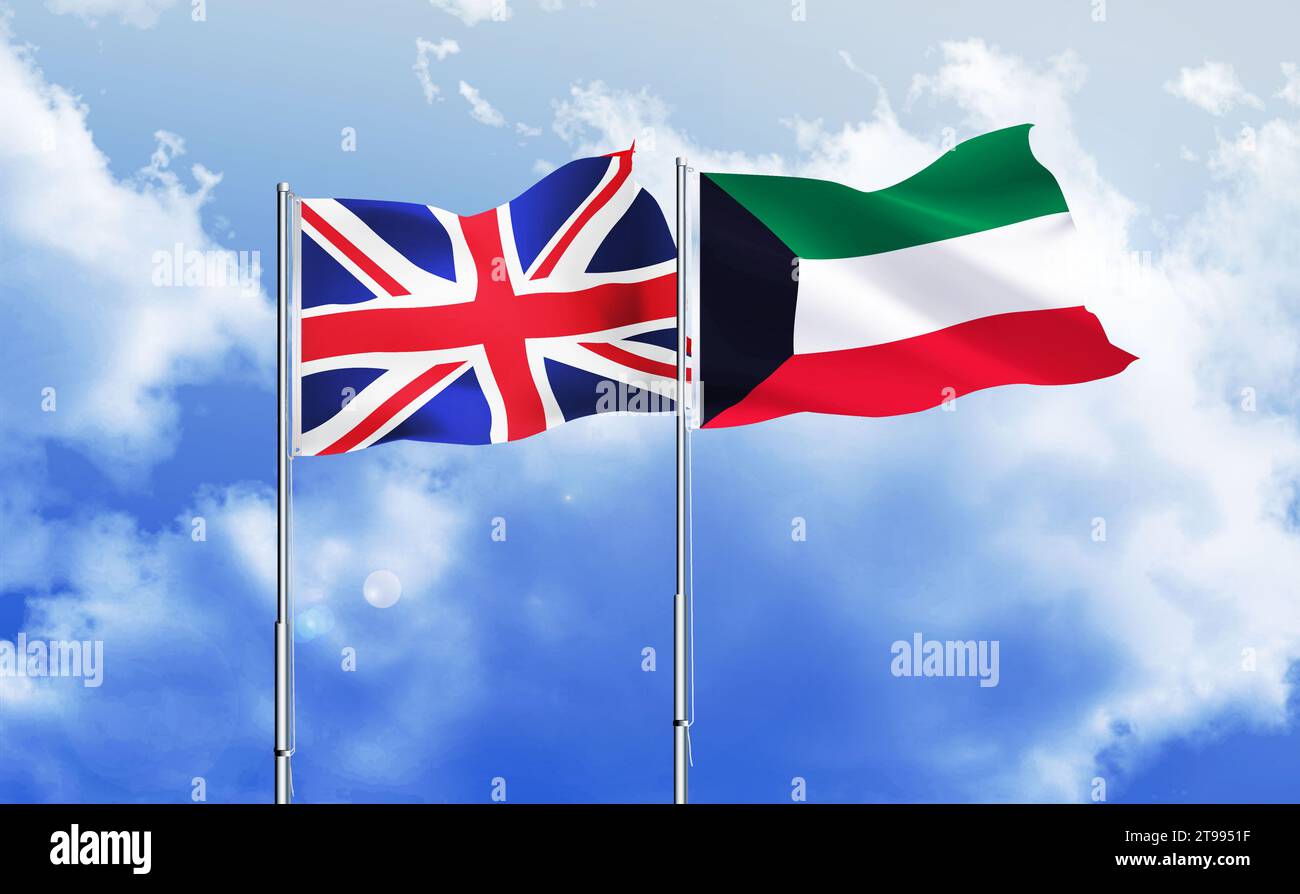 Kuwait,UK flags together waving against blue sky Stock Photo