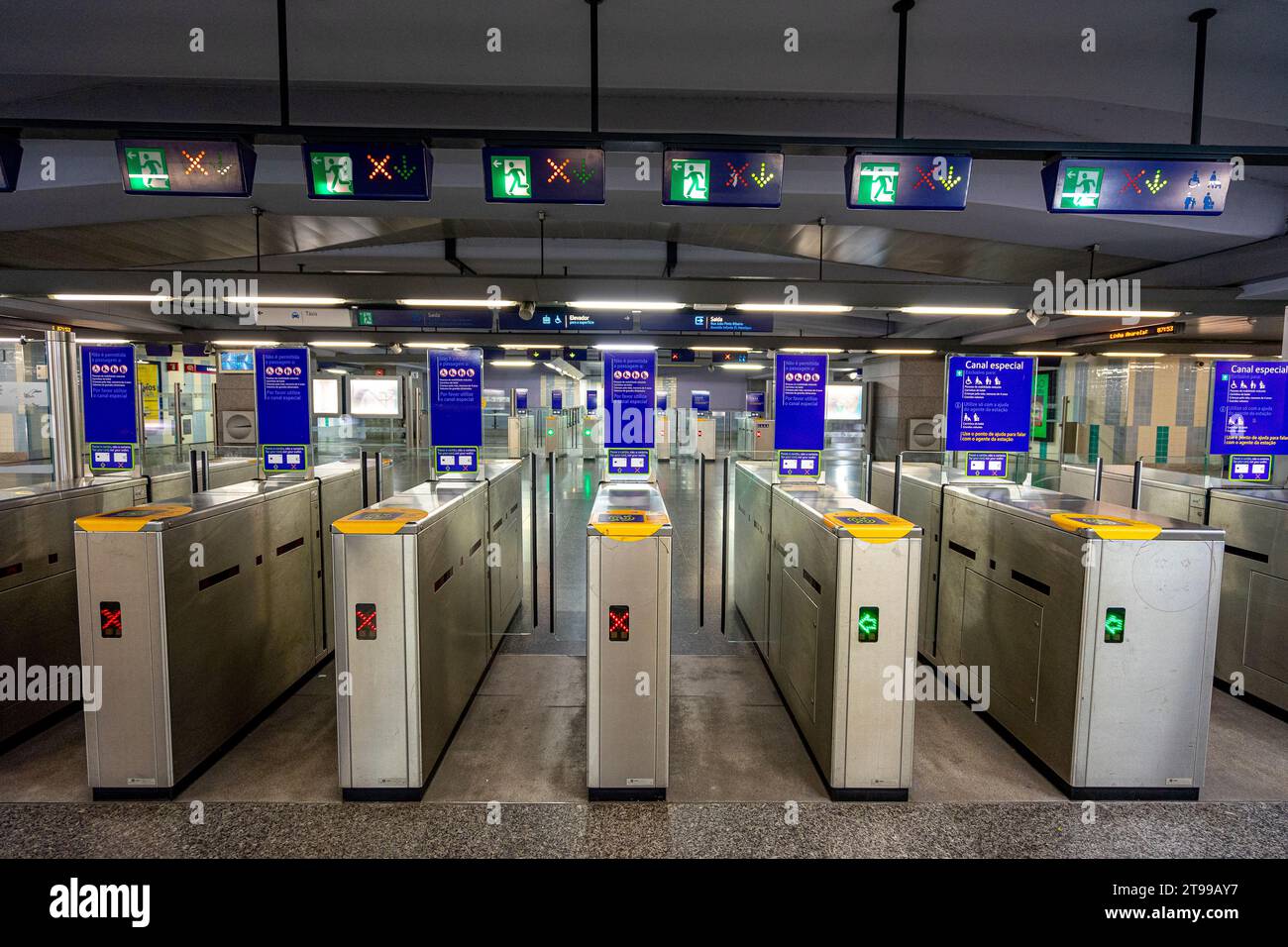 Access gates through transport tickets, tickets and passes.  Underground platform inside the station belonging to the Lisbon metro Stock Photo