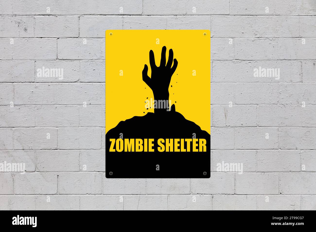 Yellow warning sign screwed to a brick wall to warn about a threat. In the middle of the panel, there is a zombie hand symbol and the message is sayin Stock Photo