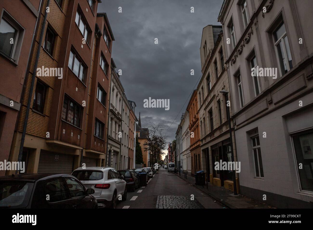 Picture of a street of Cologne, Germany, with residential buildings in the district of Nippes. Cologne is the largest city of the German western state Stock Photo
