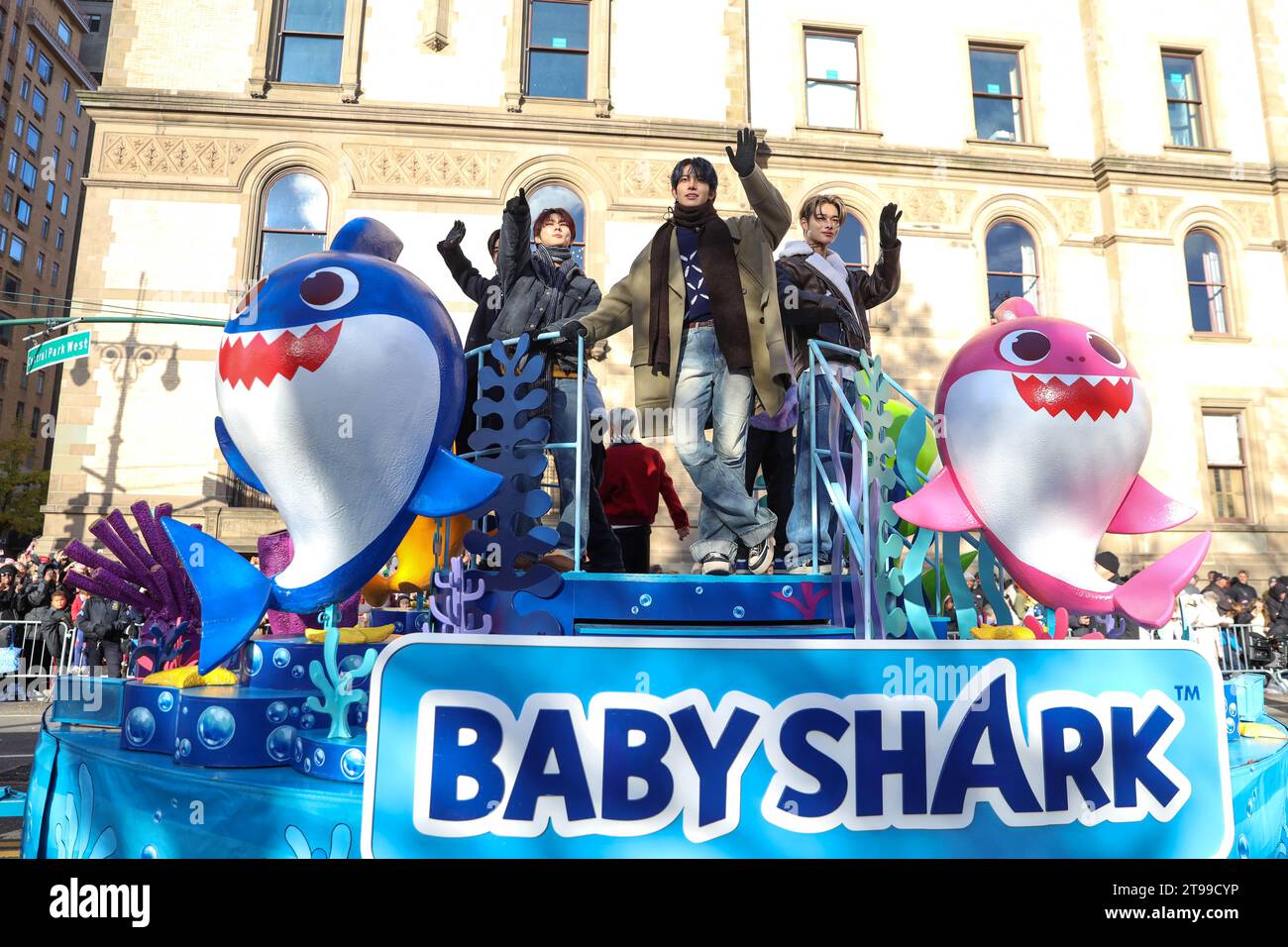 Enhypen band members ride the Baby Shark float at the 2023 Macy's
