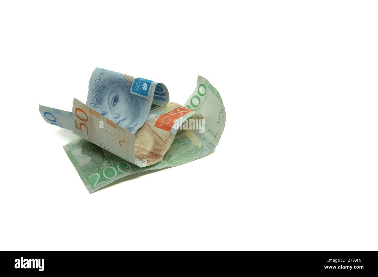 Three Swedish banknotes isolated on white, Denmark, November 23, 2023 Stock Photo