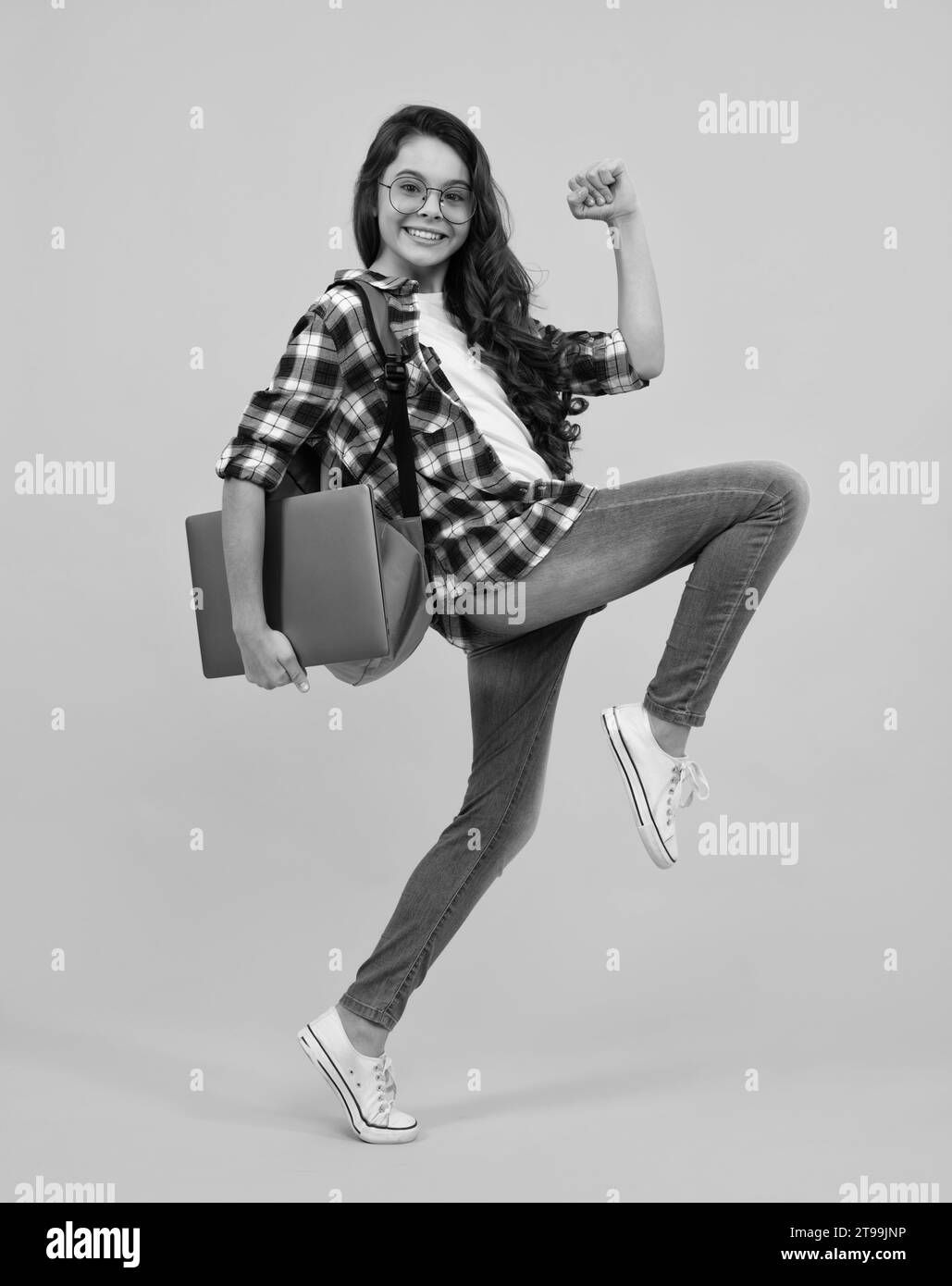 Young girl student, studying hold computer. Elearning concept. Funny