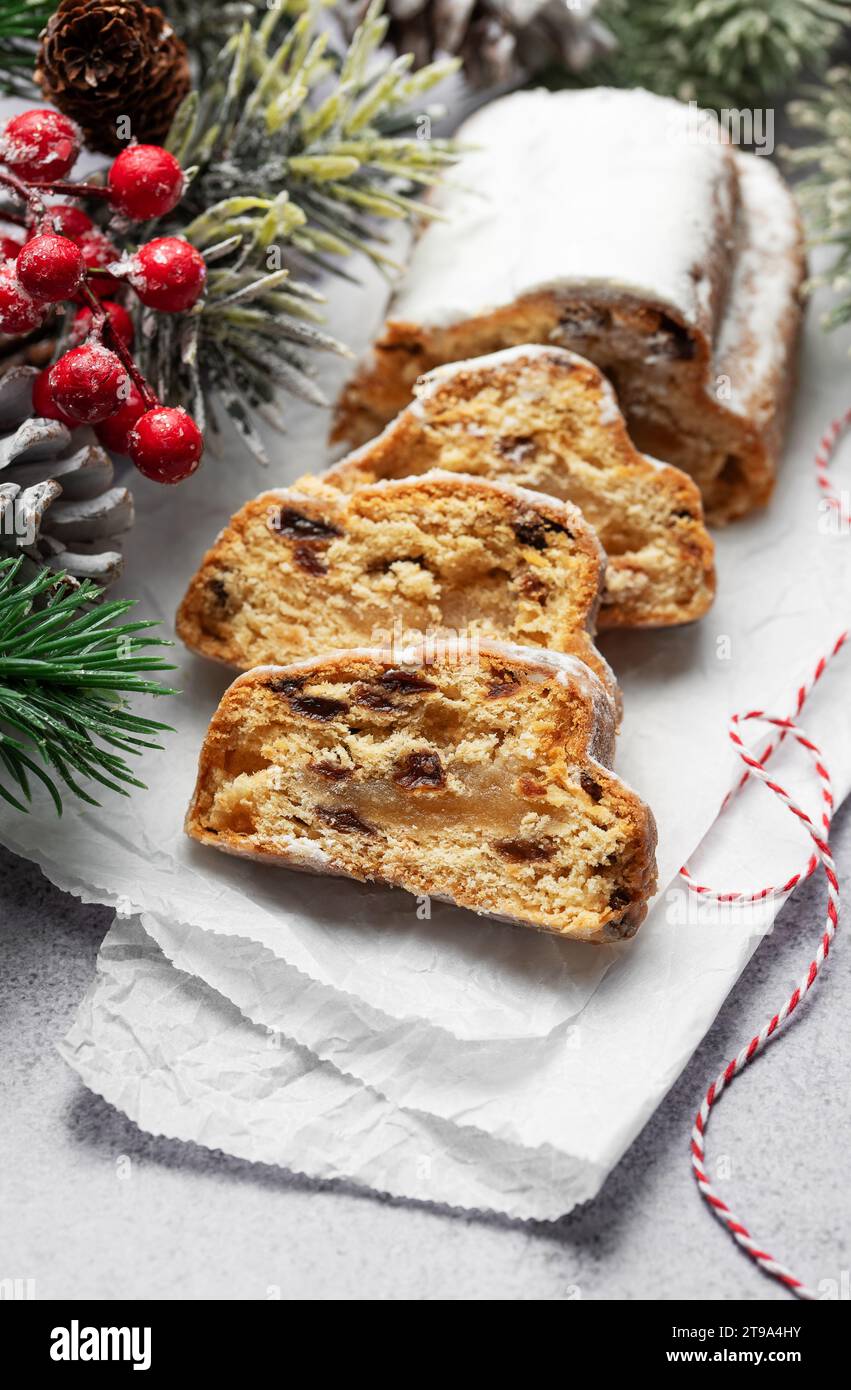 Traditional  stollen fruit cake. Christmas stollen with winter holidays decoration Stock Photo