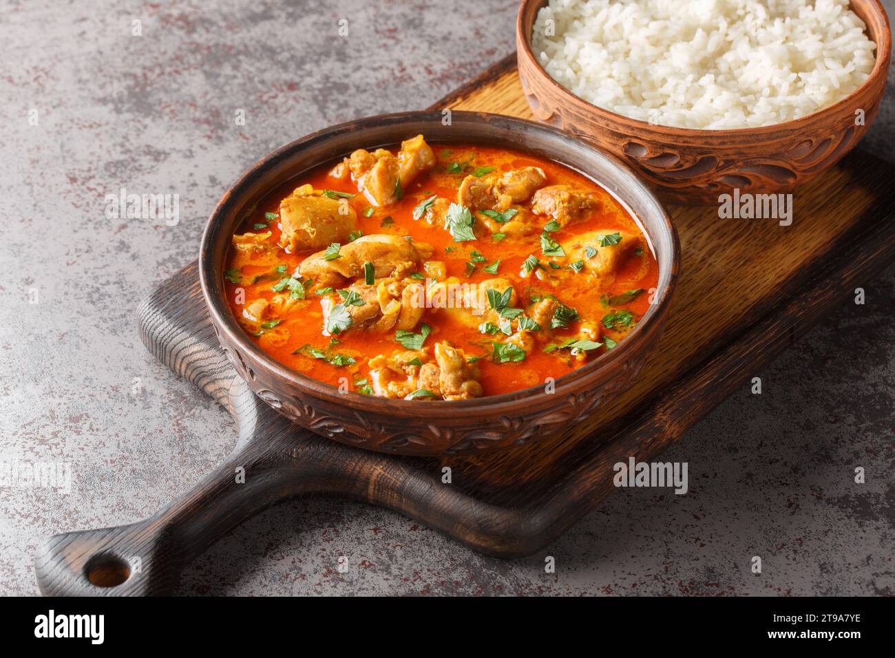 Lahori chicken curry is filled with chicken, ginger, cinnamon, cardamom, peppercorns, coriander
