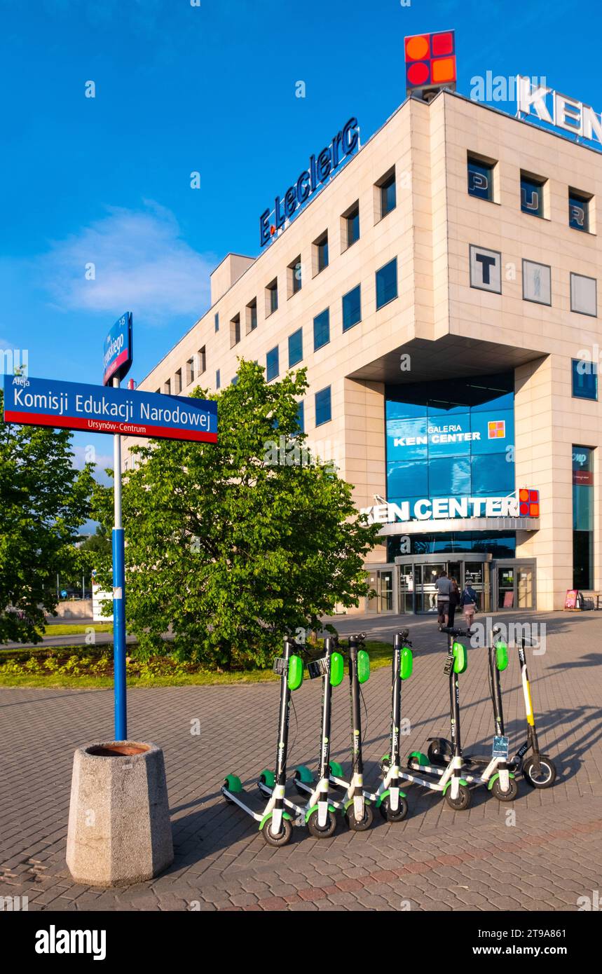 Warsaw, Poland - May 28, 2021: Electric scooters in front of KEN Center office and retail complex at KEN and Ciszewskiego street in Stoklosy quarter Stock Photo