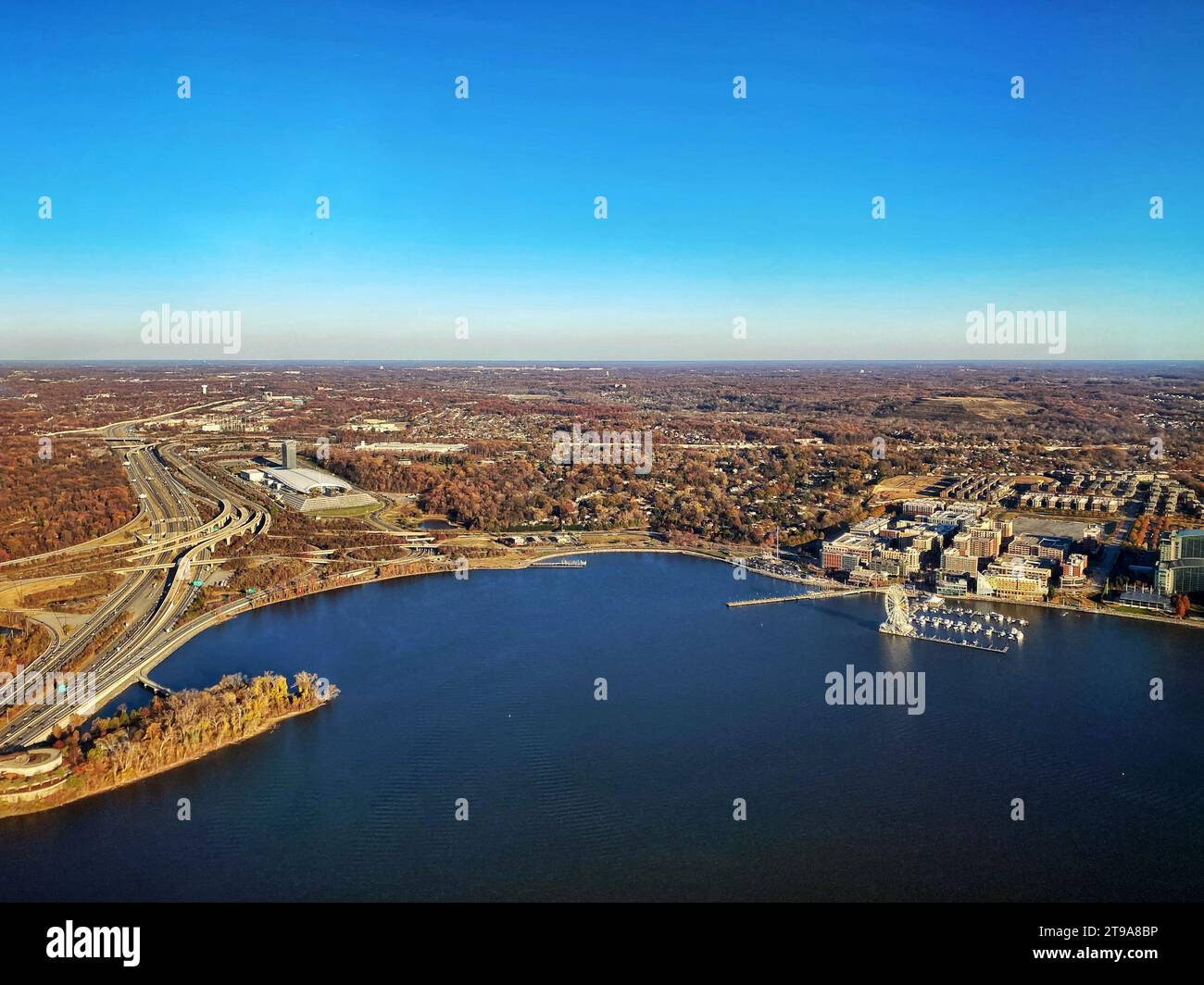 Aerial view of National Harbor, Maryland, outside Washington DC, with the Capital Wheel Ferris wheel on the Potomac River near Woodrow Wilson Bridge Stock Photo