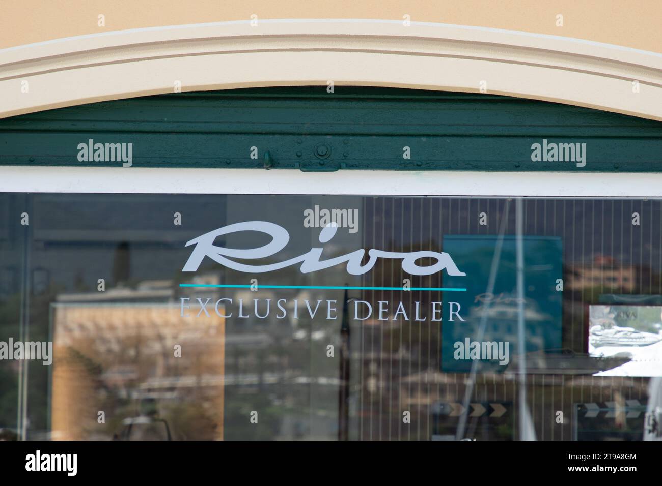 como , italy 11 16 2023 riva exclusive dealer boat sign text and